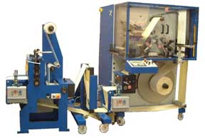 Daco Combi turret rewinder with rotary die cutting module and turn bar for the automated production of blank labels
